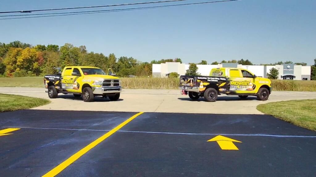 Image showing a successfully completed pavement marking project executed by Midwest Seal Team, enhancing the organization and safety of a parking lot in Fort Wayne, IN.
