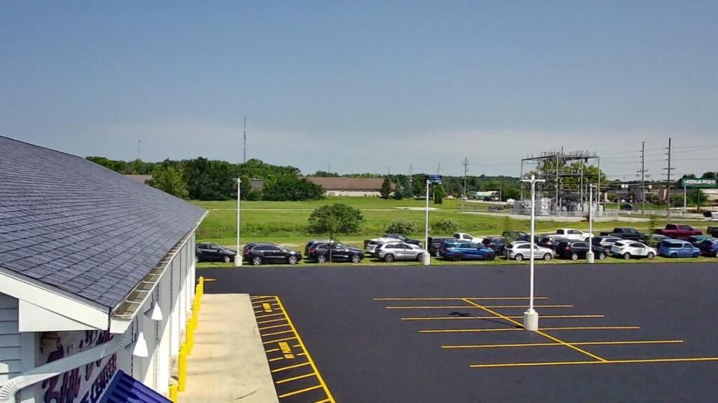 Picture of team parking lot striping operations by Midwest Seal Team in Fort Wayne, IN.
