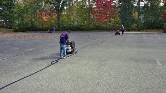 
Picture from Midwest Seal Team performing crack filling services in a commercial parking lot in Fort Wayne, IN.
