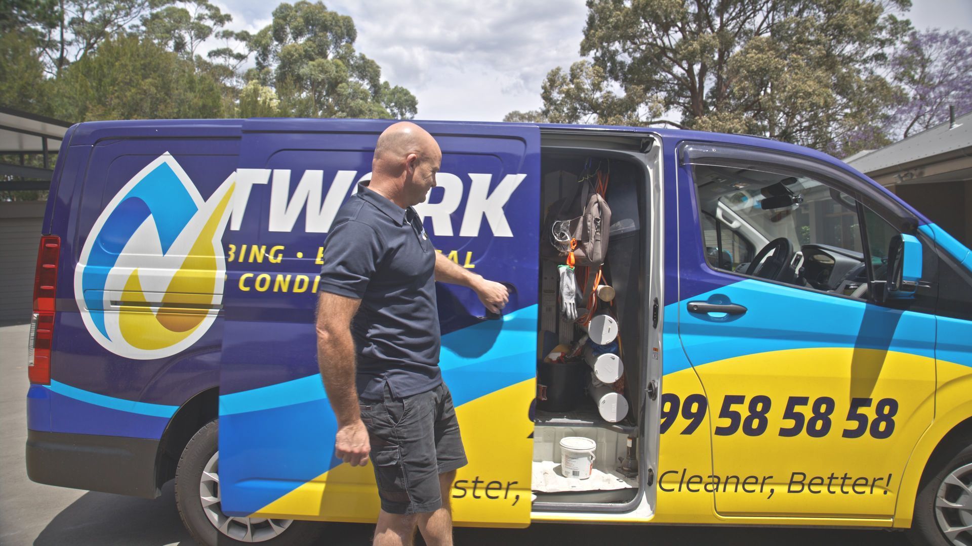 Network Plumbing Truck parked residential