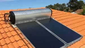 Solar cells and a water heater on a roof