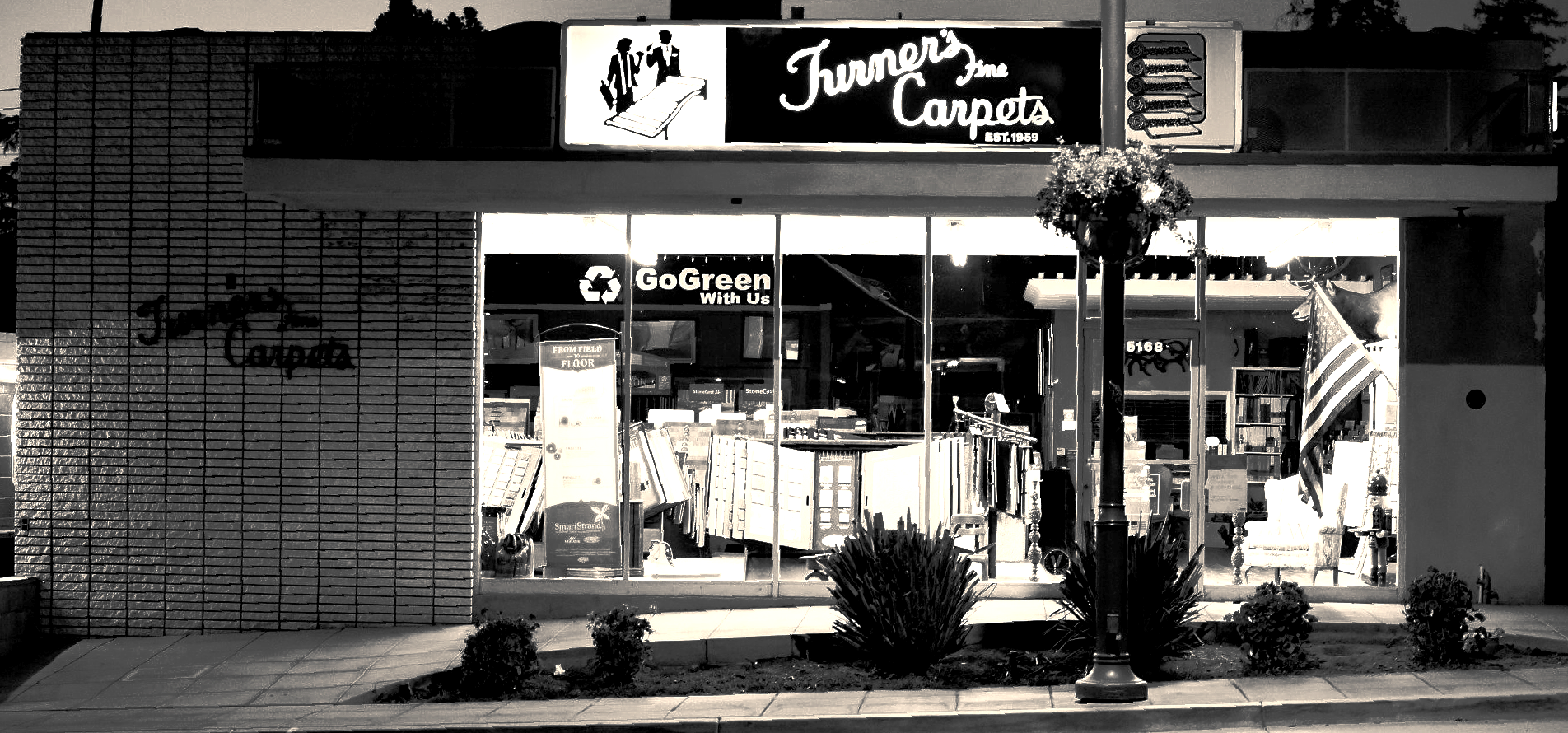 Turner's Carpets and Flooring  Yucaipa Since 1965 Black & White Photo of Carpet Store at night