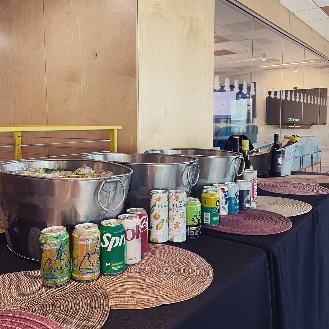 Several cans of sprite are sitting on a table