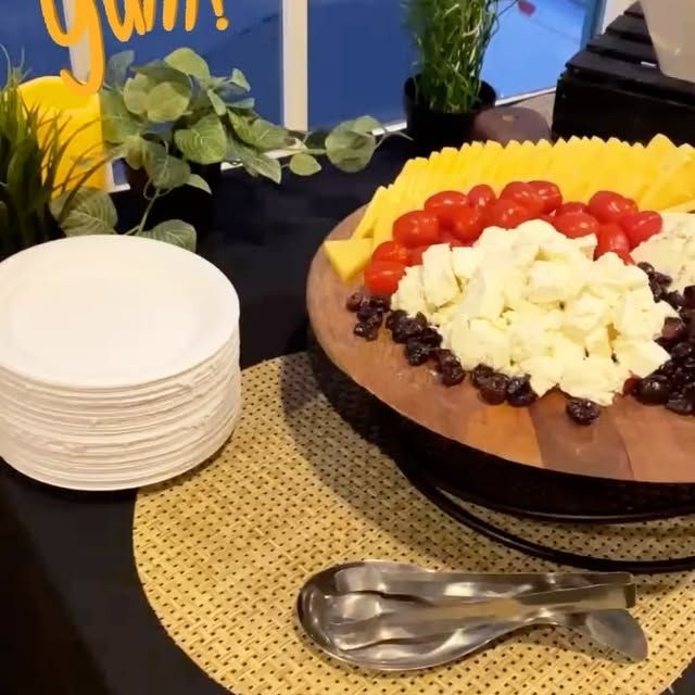 A tray of food on a table with a sign that says win