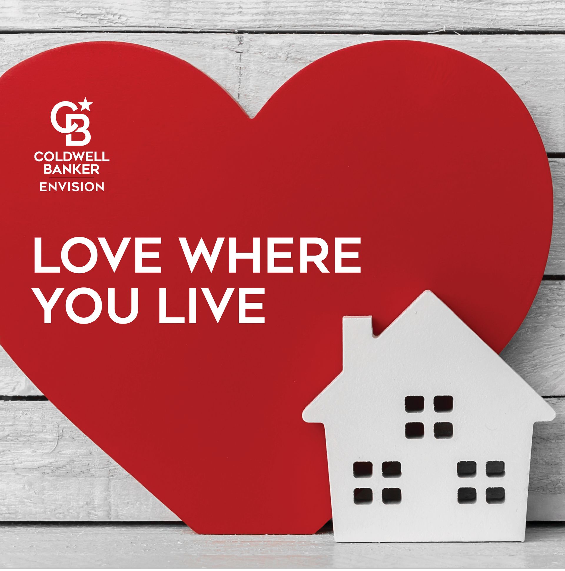 A room with a table and stools and a potted plant