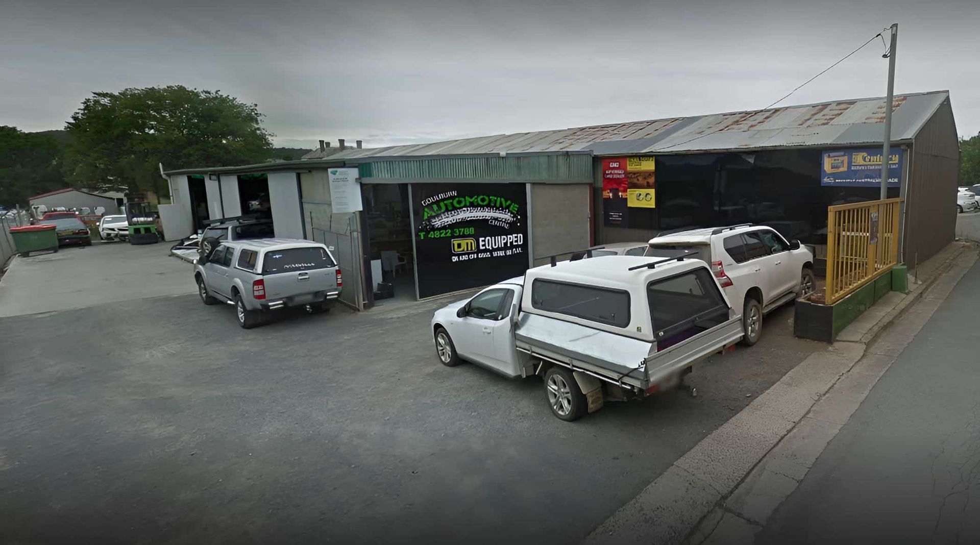 A Group Of Cars Are Parked In Front Of A Building — Goulburn Automotive Centre In Goulburn, NSW