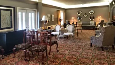 A living room filled with furniture and a couch.