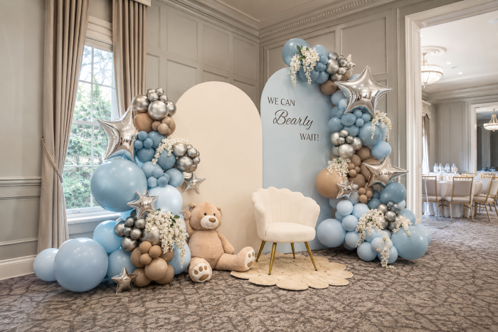 Luxury teddy bear baby shower organic balloon garland backdrop wall in tan, cream, light blue, brown and silver — Balloon Concierge Los Angeles