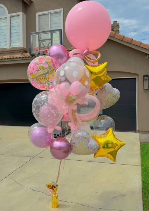 50th birthday balloon delivery Los Angeles — gold number balloons and organic garland — Balloon Concierge