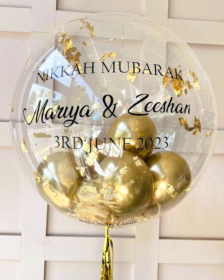 Outdoor balloon arch installation at Los Angeles event by Balloon Concierge