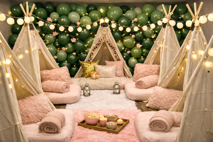 Slumber party balloon decorations Los Angeles — pastel garland and sleepover tent setup — Balloon Concierge