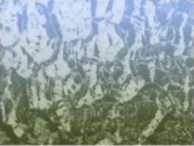 A close up of a piece of glass with a pattern on it