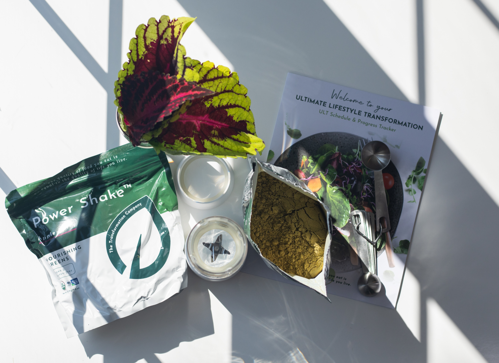 Woman receiving body contouring treatment with a handheld device on her thigh.