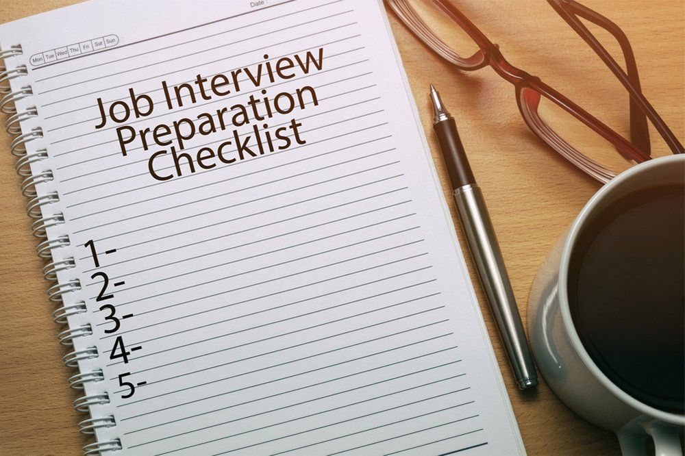 Job Interview Preparation Checklist written on notebook - business conceptual