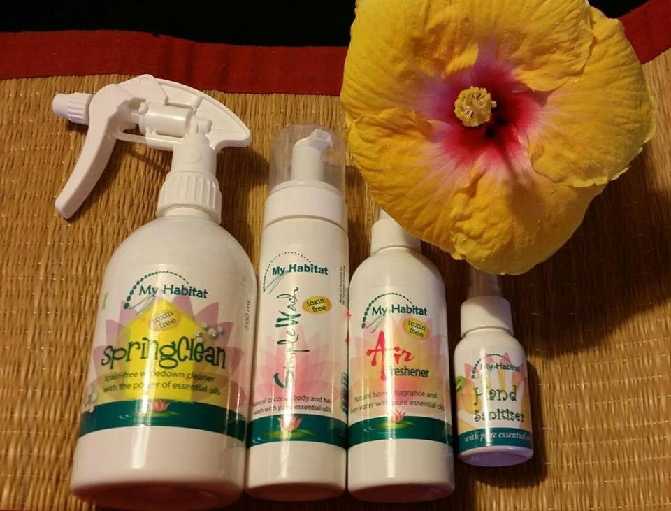 White Skincare Bottles on A Wooden Tray with Green Plants — My Habitat Products in Cairns, QLD