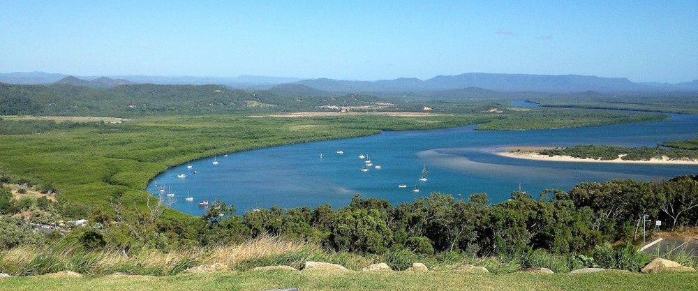 Panoramic View of A Blue Bay Surrounded by Green Trees — My Habitat Products in Cooktown, QLD