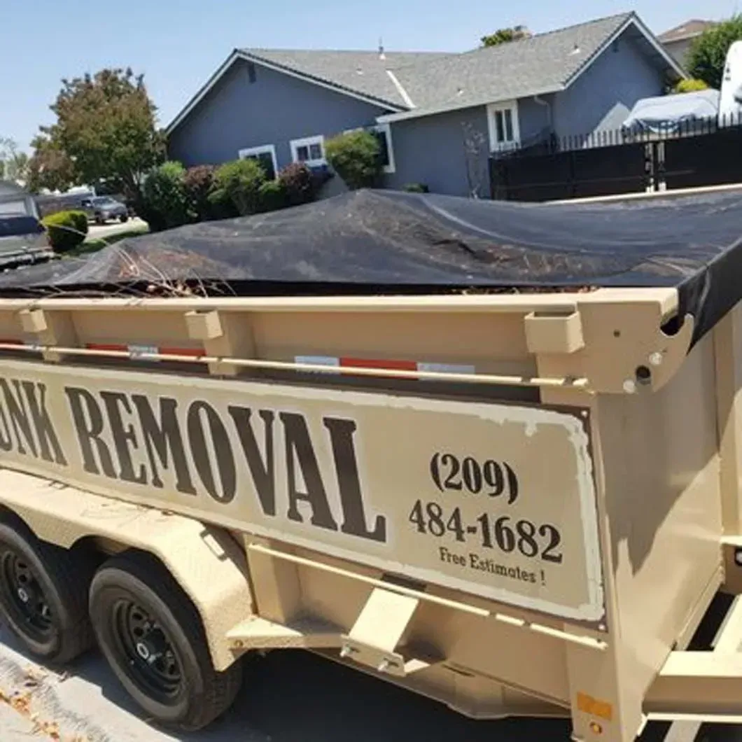A dumpster with the word removal on it