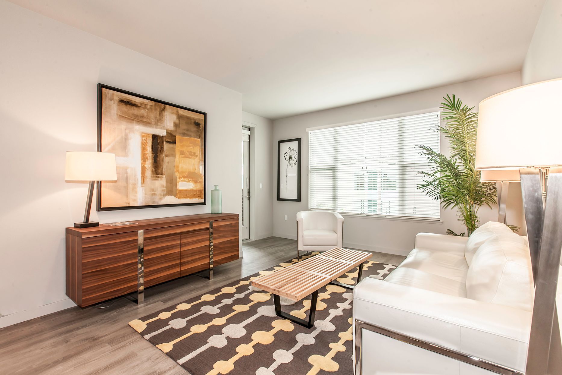 idora apartments living room side view with drawers