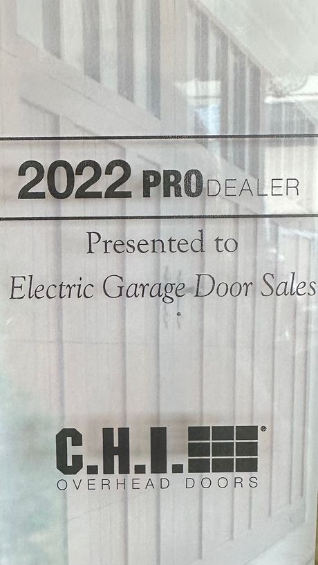 A sign that says 2022 project presented to electric garage door sales - Monaca, PA - Electric Garage Door Sales