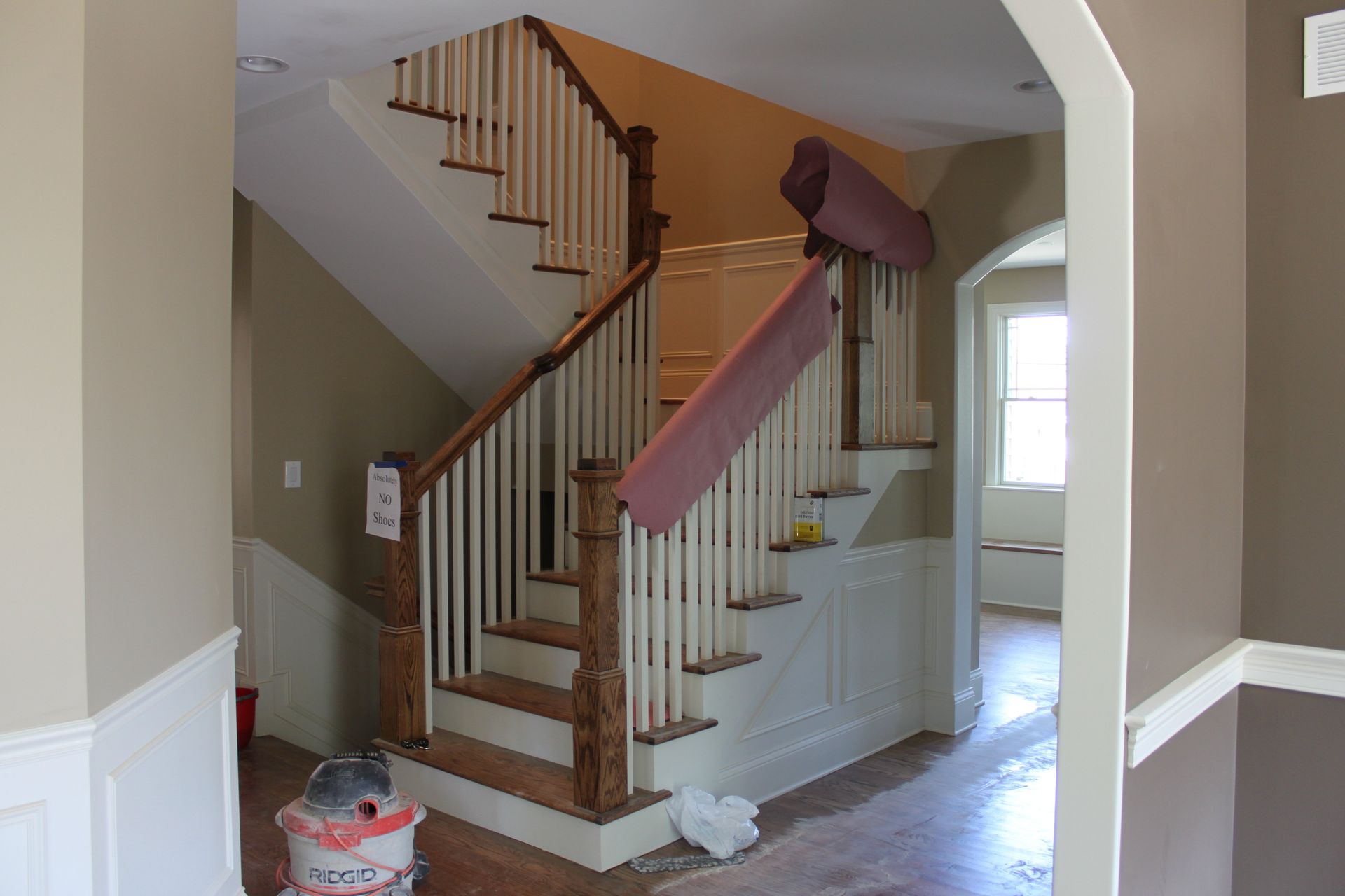 A staircase in a house that is being remodeled