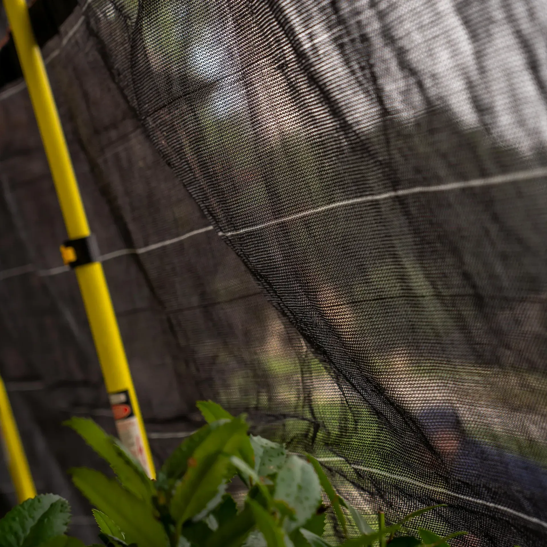 Redline Roofing in Dickson, TN using The Catch-All system to protect a customer's house 