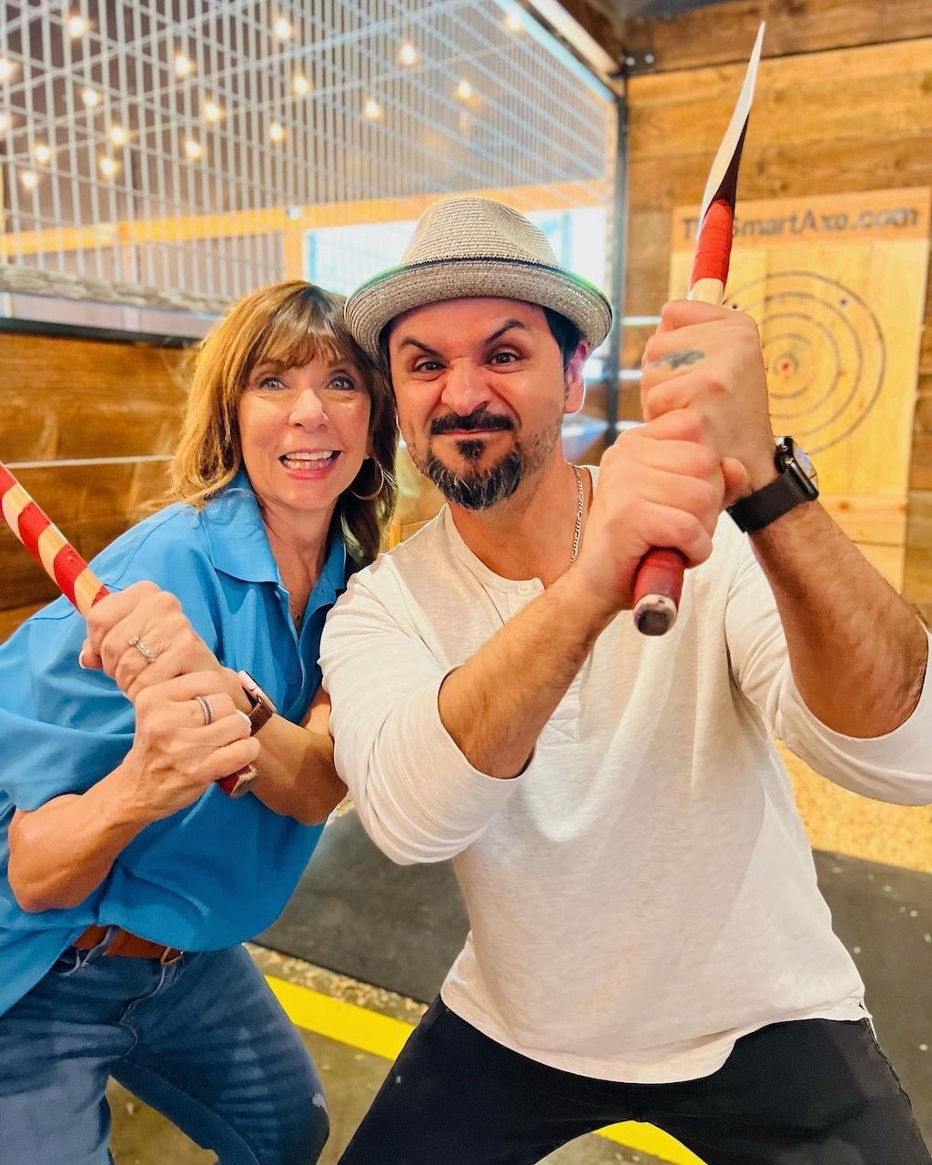 Nancy and Cesar at axe throwing retreat