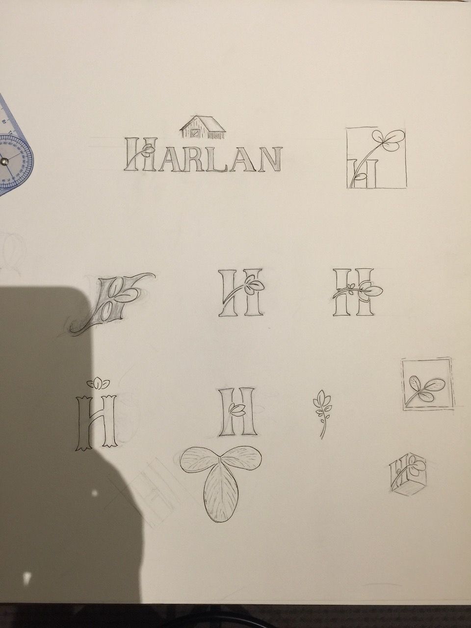 harlan logo sketches
