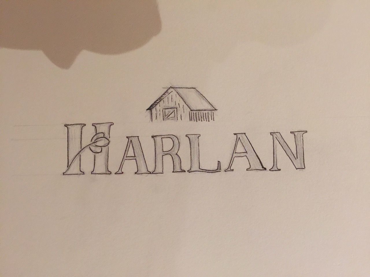 harlan logo sketches