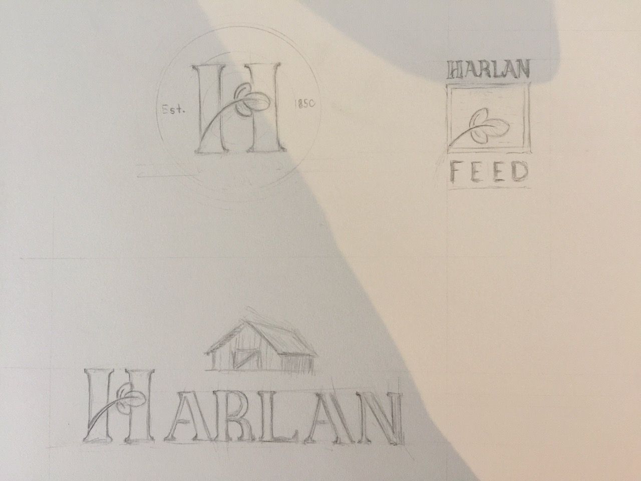 harlan logo sketches