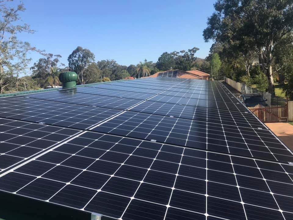 A Roof With A Lot Of Solar Panels On It — GJT Electrical In Warners Bay, NSW