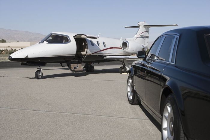 Private Business Jet Airplane With Luxury Car
