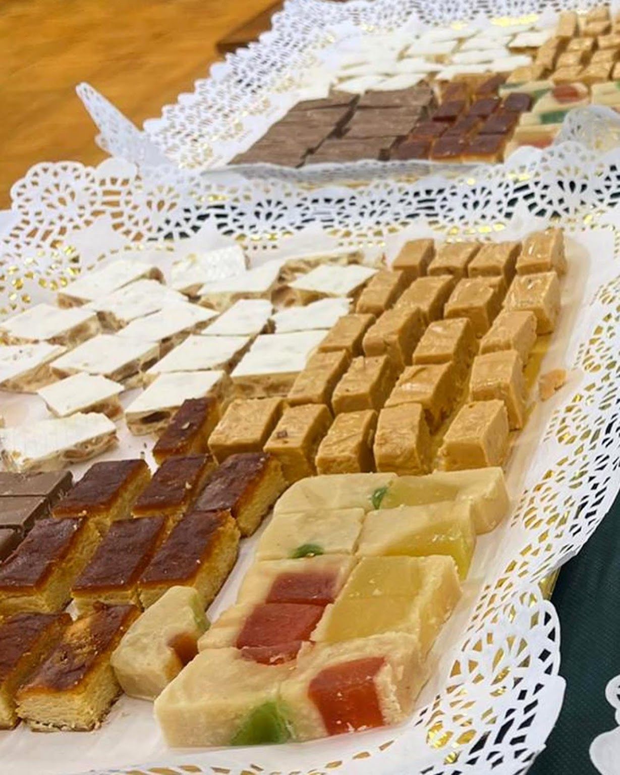 A tray of different types of desserts on a table