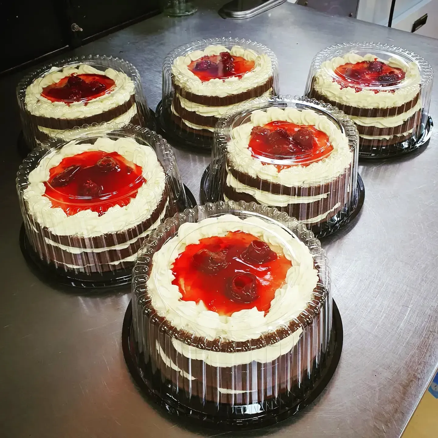 Six Round Cakes With White Frosting, Chocolate Sides — Atherton Bakehouse in Atherton, QLD