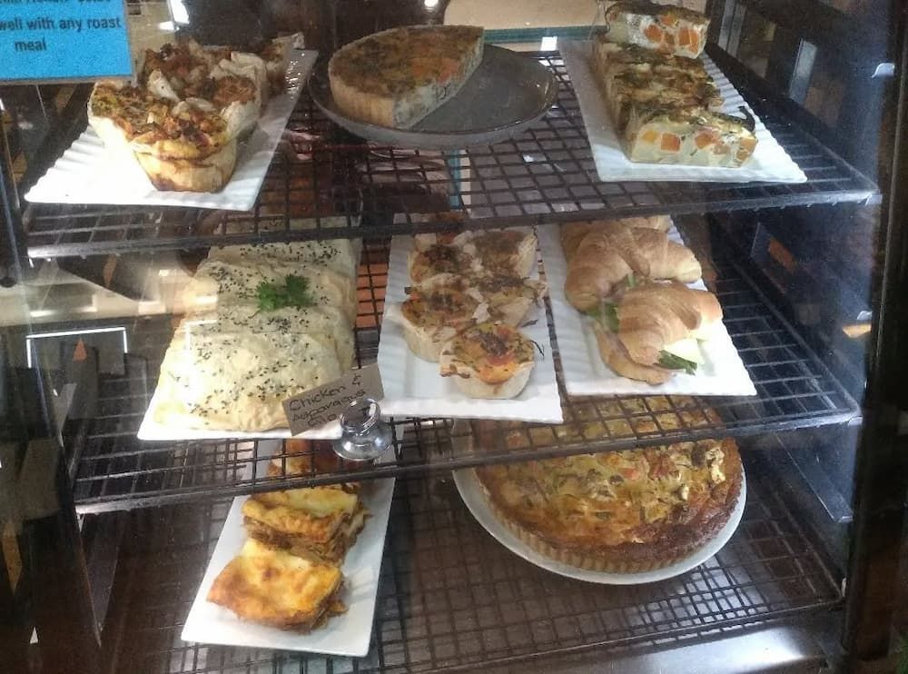 A Display Case Filled With A Variety Of Pastries And Sandwiches — Vines at 139 in Grafton, NSW