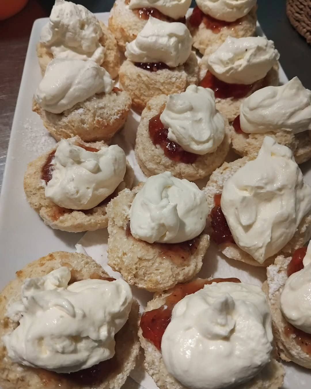 A Tray Of Scones With Jam And Whipped Cream On Top — Vines at 139 in Grafton, NSW