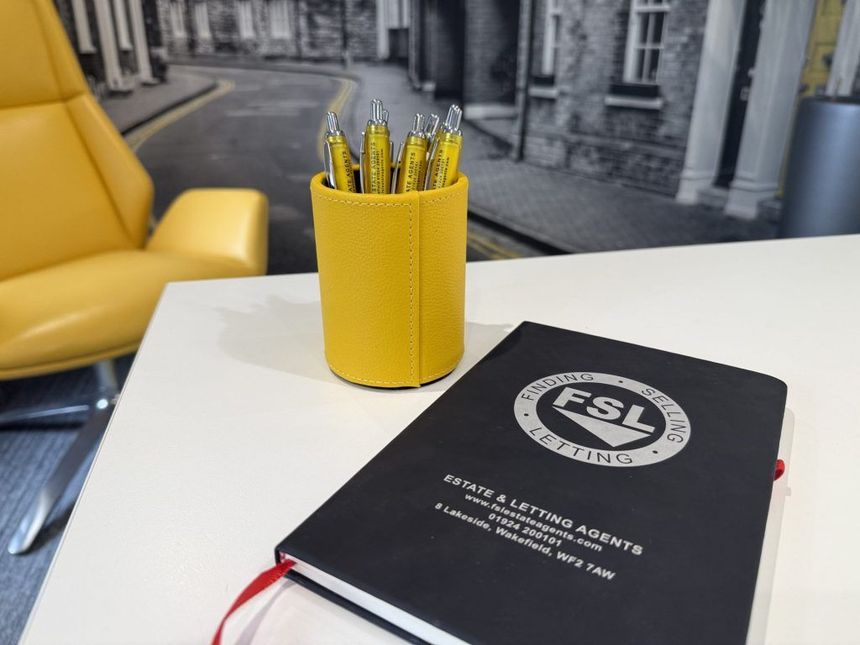 FSL Estate Agents pen and notebook