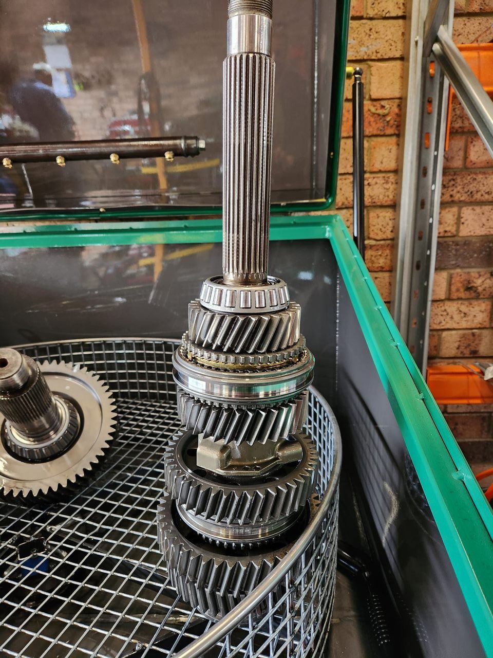 A stack of gears sitting on top of each other in a basket.