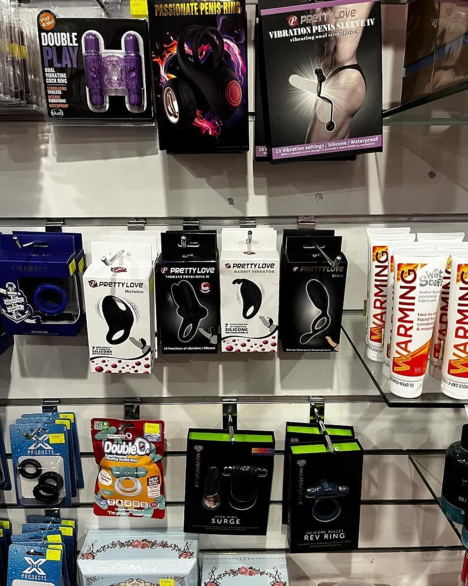 A Shelf with Various Toys and Other Objects — Laneway Adult Shop in Port Douglas, QLD