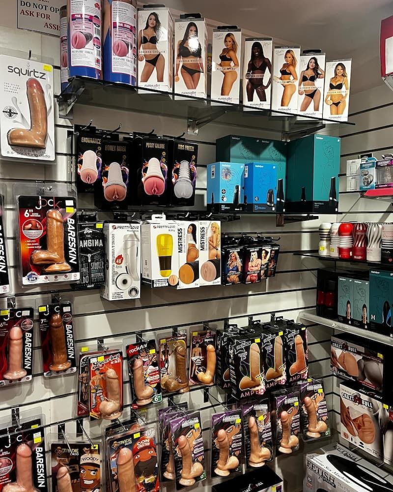 A Shelf with Various Adult Toys on It — Laneway Adult Shop in Port Douglas, QLD