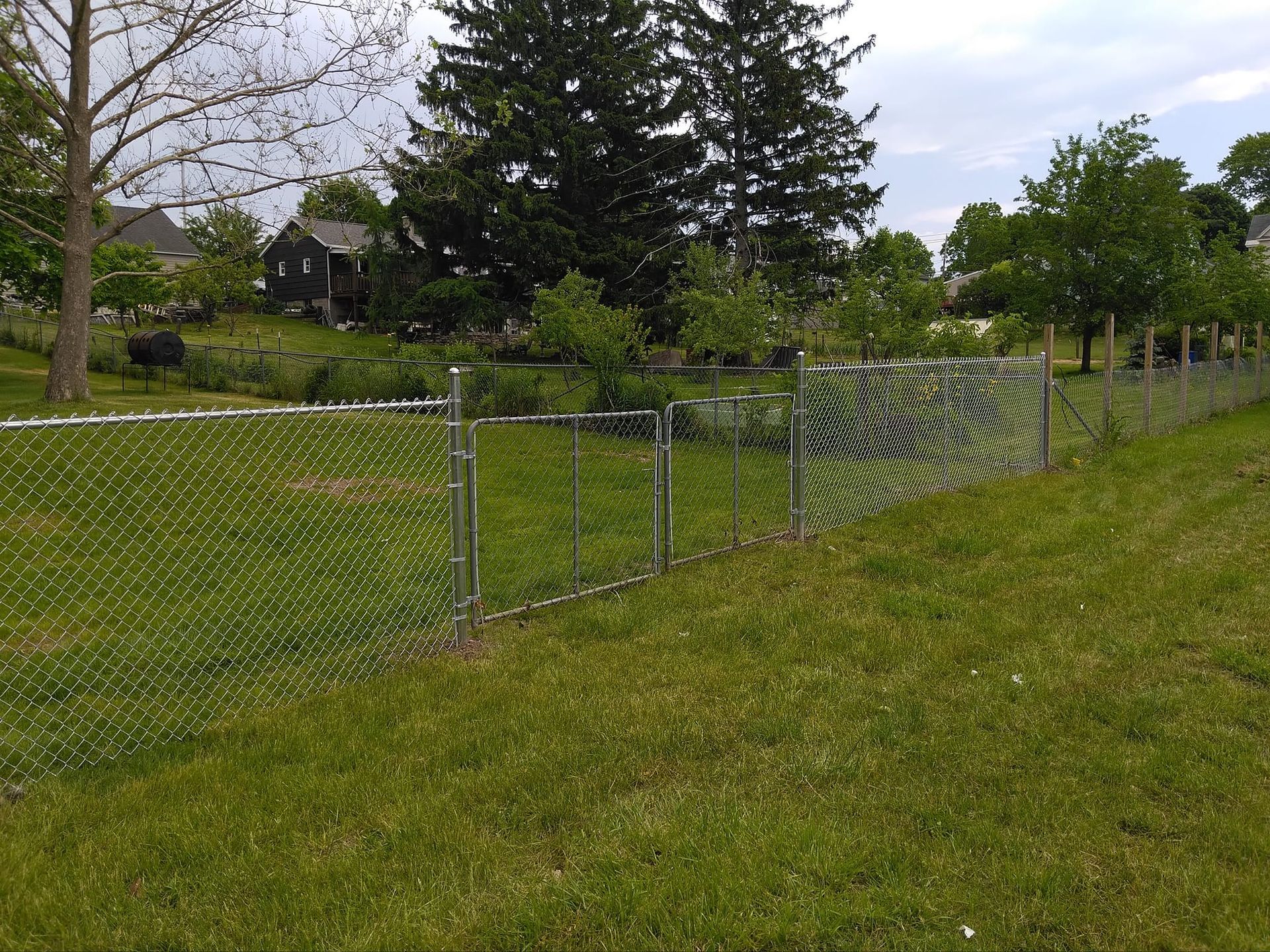 Chain Link Fence with Gate — Baldwinsville, NY — Gratton's Welding & Fabricating LLC
