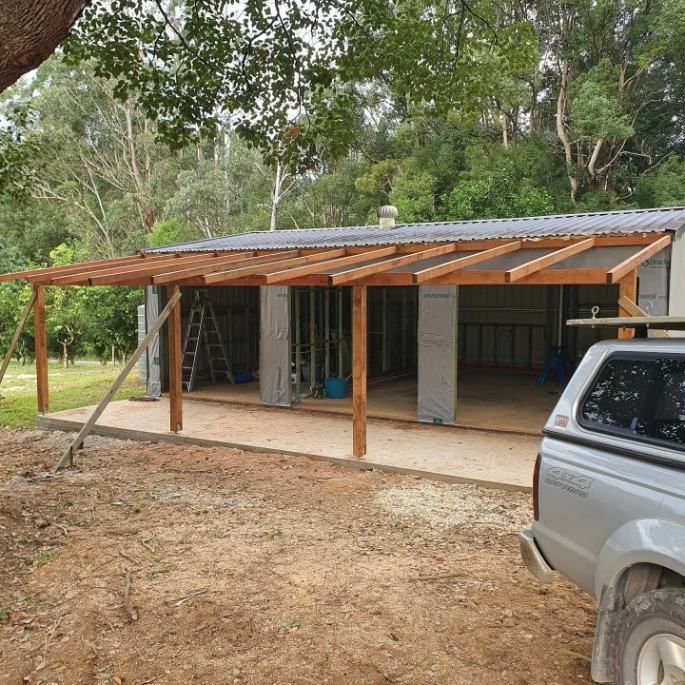 A Truck is Parked in Front of a Building Under Construction — Offcut Carpentry In Murwillumbah, NSW
