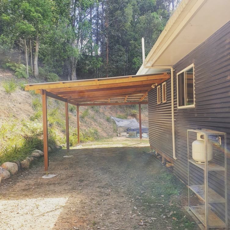 A House With a Covered Walkway Leading to It — Offcut Carpentry In Murwillumbah, NSW