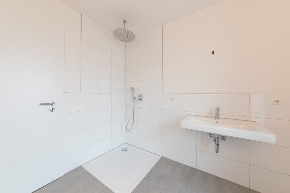 A Bathroom With a Sink , Shower and Shower Head — Offcut Carpentry In Byron Bay, NSW