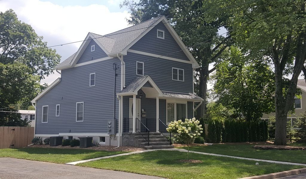 Residential House with Gray Siding — Hackensack, NJ — Classic Remodeling
