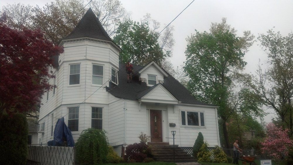 House with Cone Shingle Roof — Hackensack, NJ — Classic Remodeling