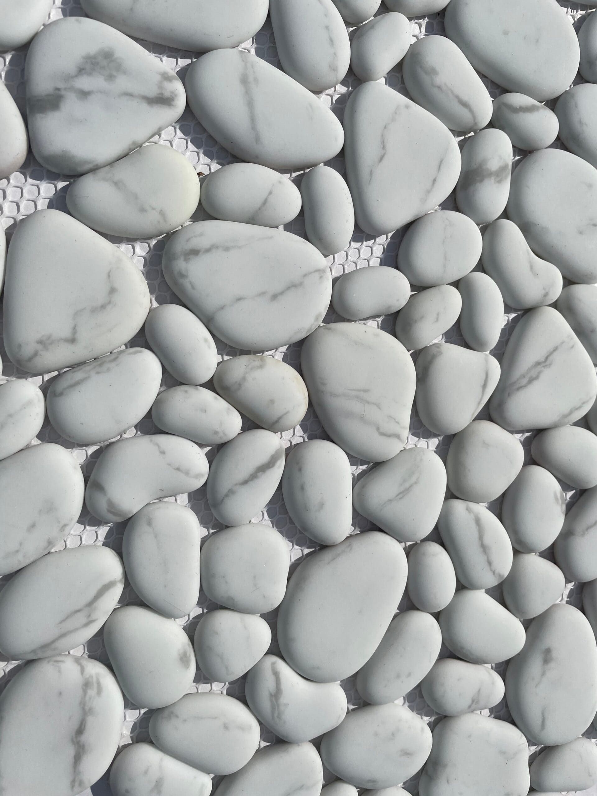 Bring the spa home with this white pebble mosaic, ideal for shower floors or natural-look features.