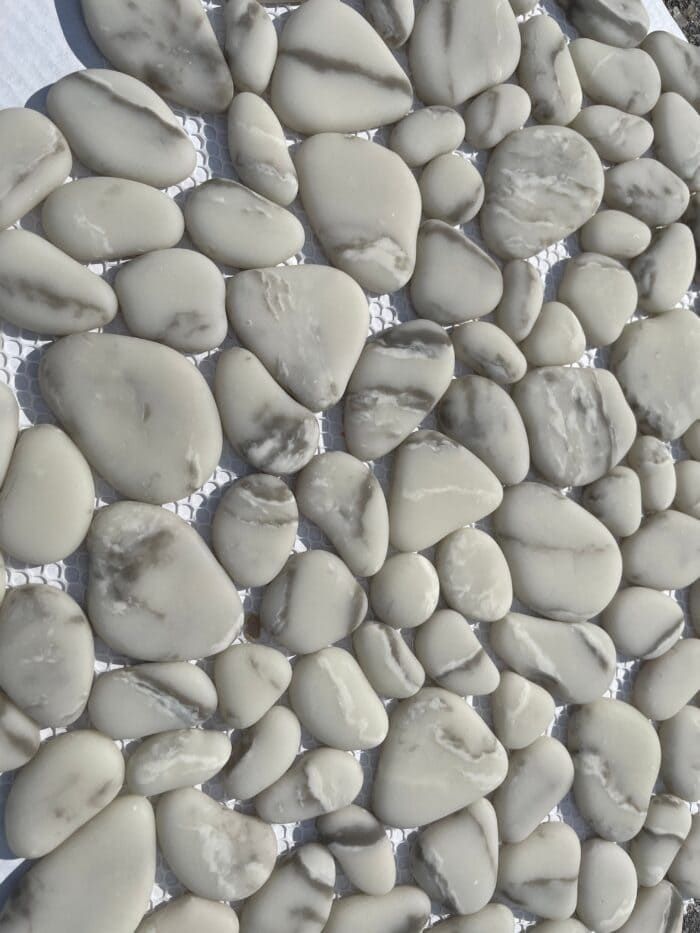 Pebble Grigio mosaic brings together cool grey tones and natural shapes, perfect for earthy, modern bathrooms.