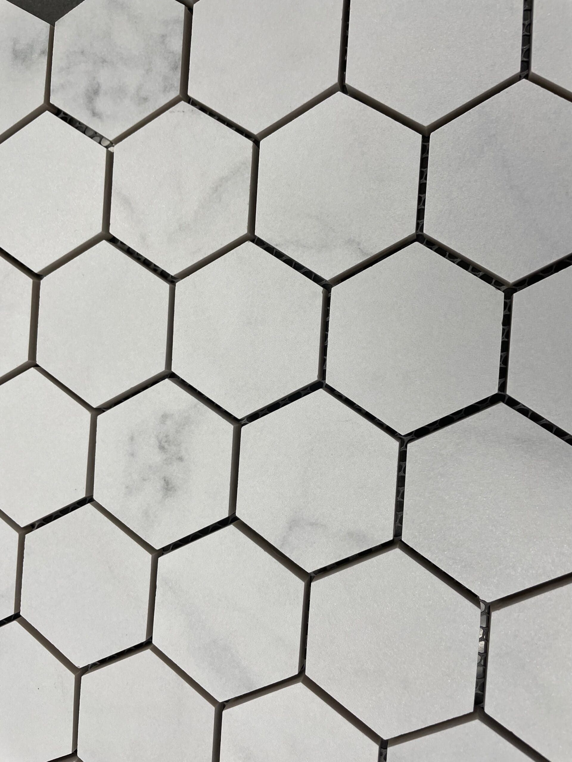 2x2-inch antislip porcelain hexagon mosaic tile in a matte finish, designed for safe and stylish shower floors.