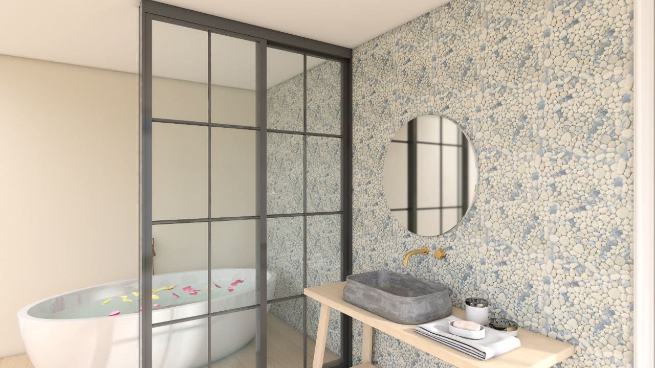 Riva Blue Pebbles mosaic tiles offer soft blue-tinted river stone charm.