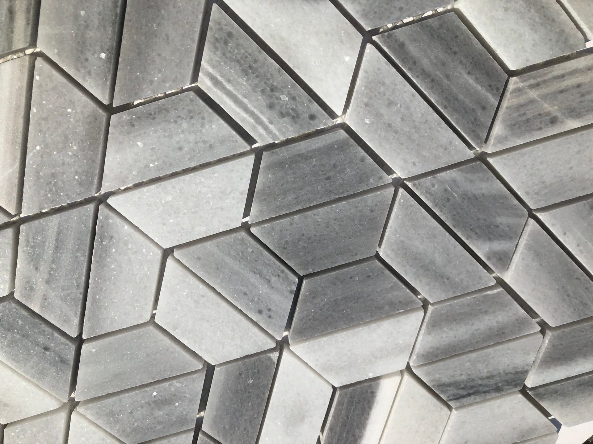 Skyfall Marmol Hexagon mosaic blends marble veining and geometric precision for a modern-meets-classic tile look.